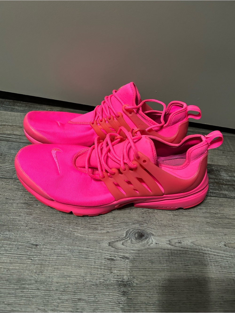 Nike Air Presto sneakers in a vibrant hyper bright hit pink colorway
